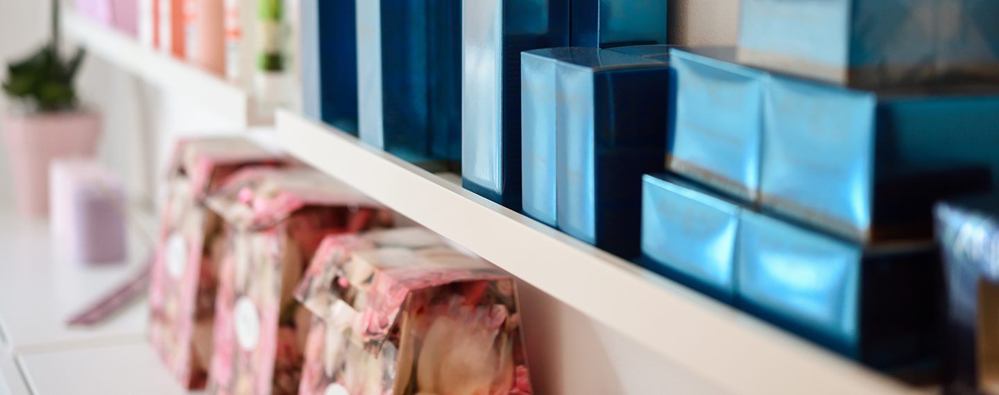 Cosmetic section with facial cream, conditioners, shampoo and hair treatment in store